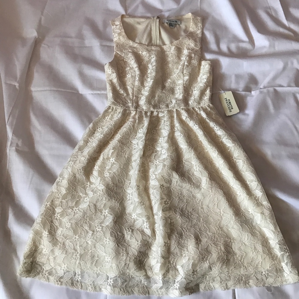Cream sleeveless lace dress