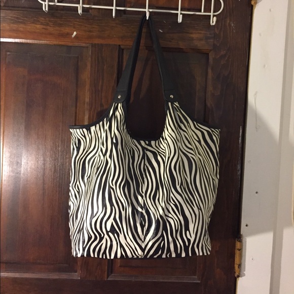 Xhilaration Handbags - $$5 for $25. Zebra print Tote
