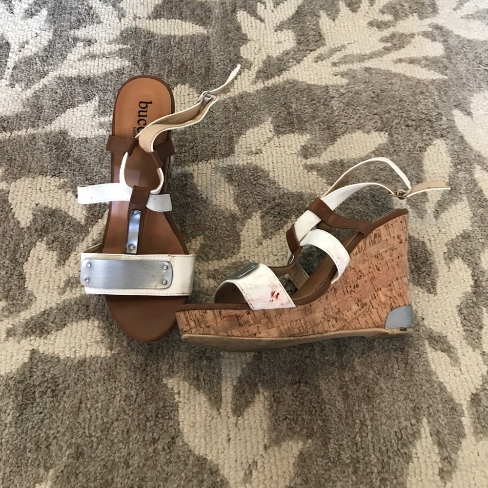 White and silver bucco wedges