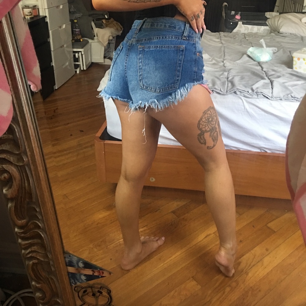 Distressed denim shorts