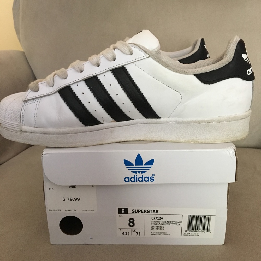 Black and white shell toe adidas superstar