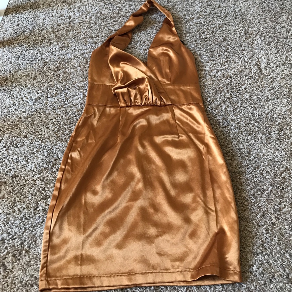 Gold, tight dress. Worn only once.