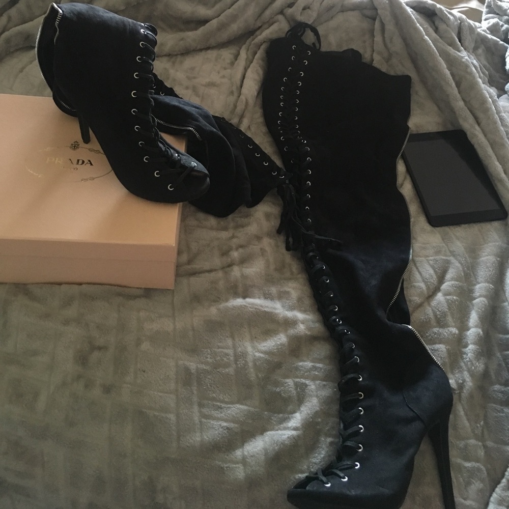 Lace up over the thigh high boots