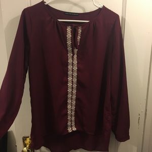 Maroon blouse with white pattern