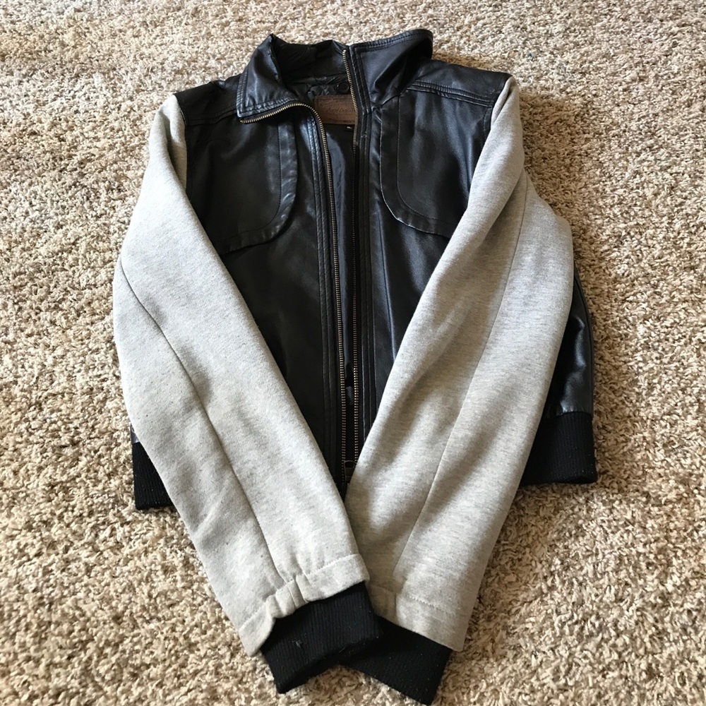 Black leather sweater with gray sleeves