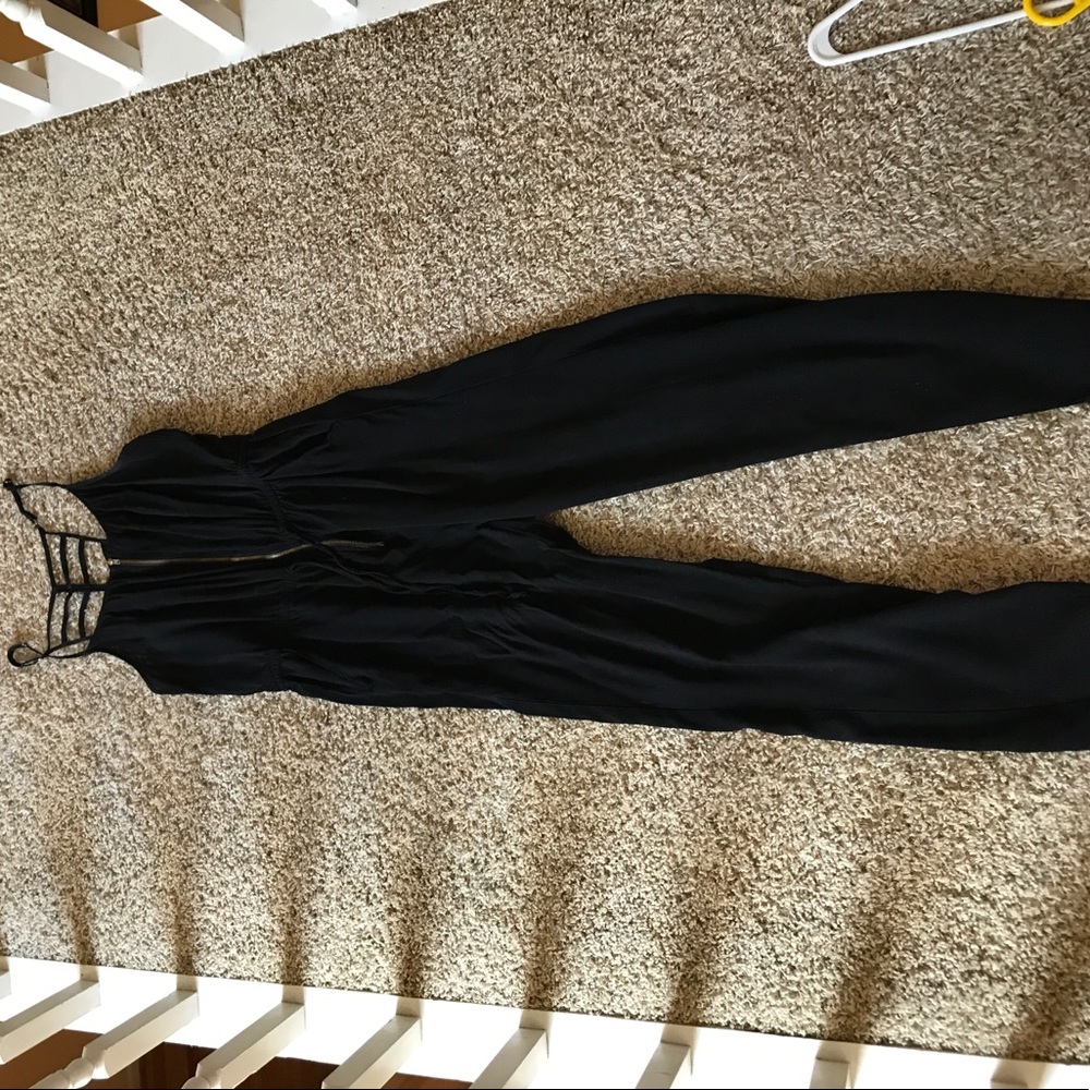 Black jumpsuit!  Worn up to 5 times.