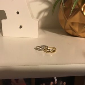 never worn set of two gold & silver infinity rings