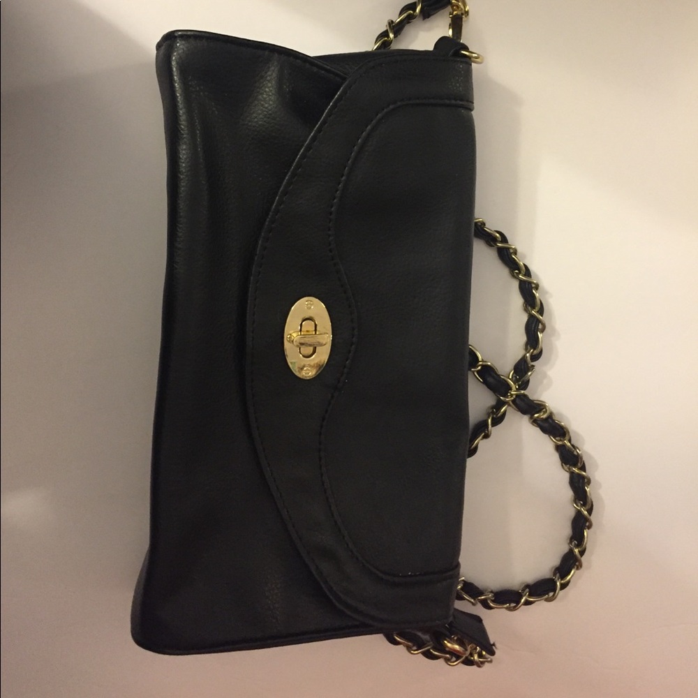 Black purse with gold hardware