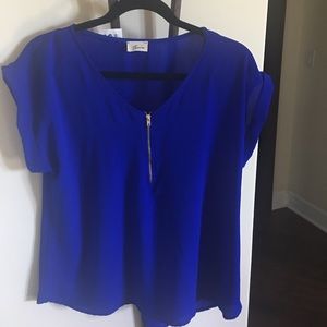 Blue Blouse size L. Zipper opening in front.