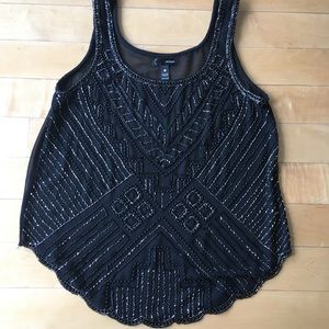 Semi-sheer black beaded blouse with scalloped trim