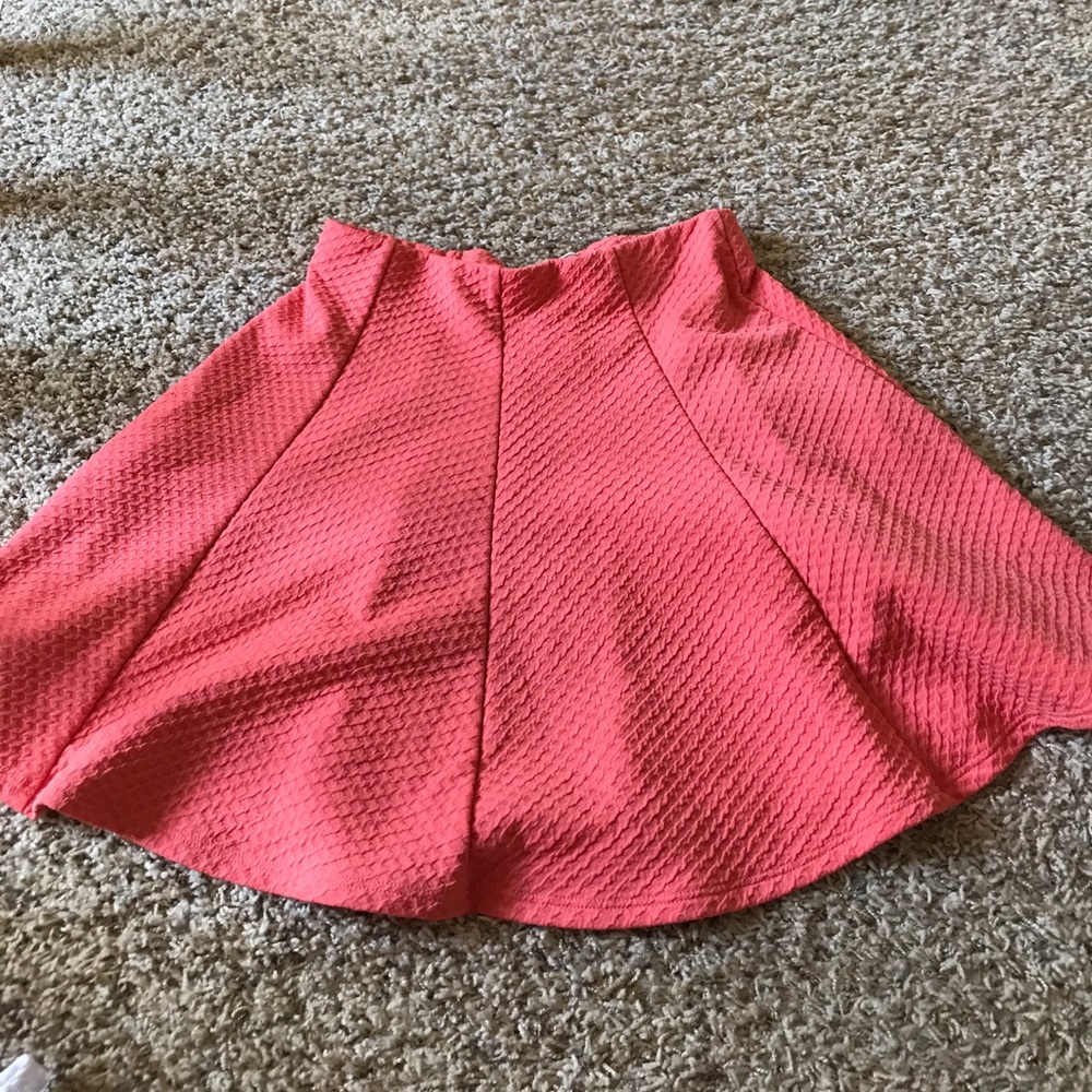 Orange colored skirt. Worn only once.