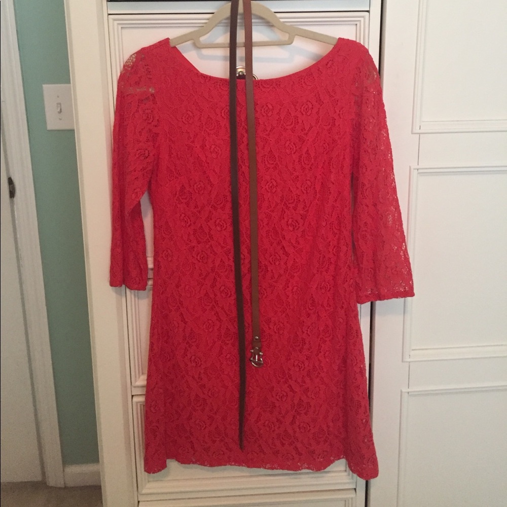 Orange lace mini dress with tan belt