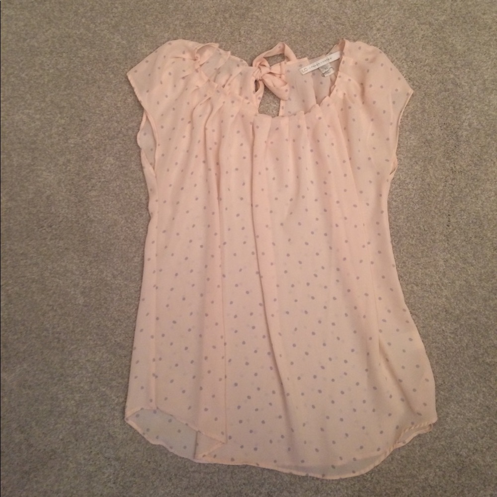 A peach and lavender colored shirt