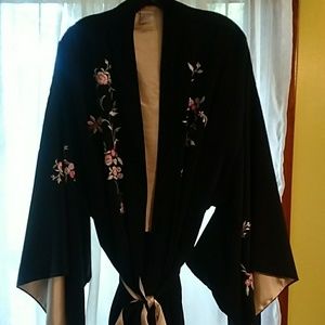 A Japanese Black silk robe. Natori embroidered