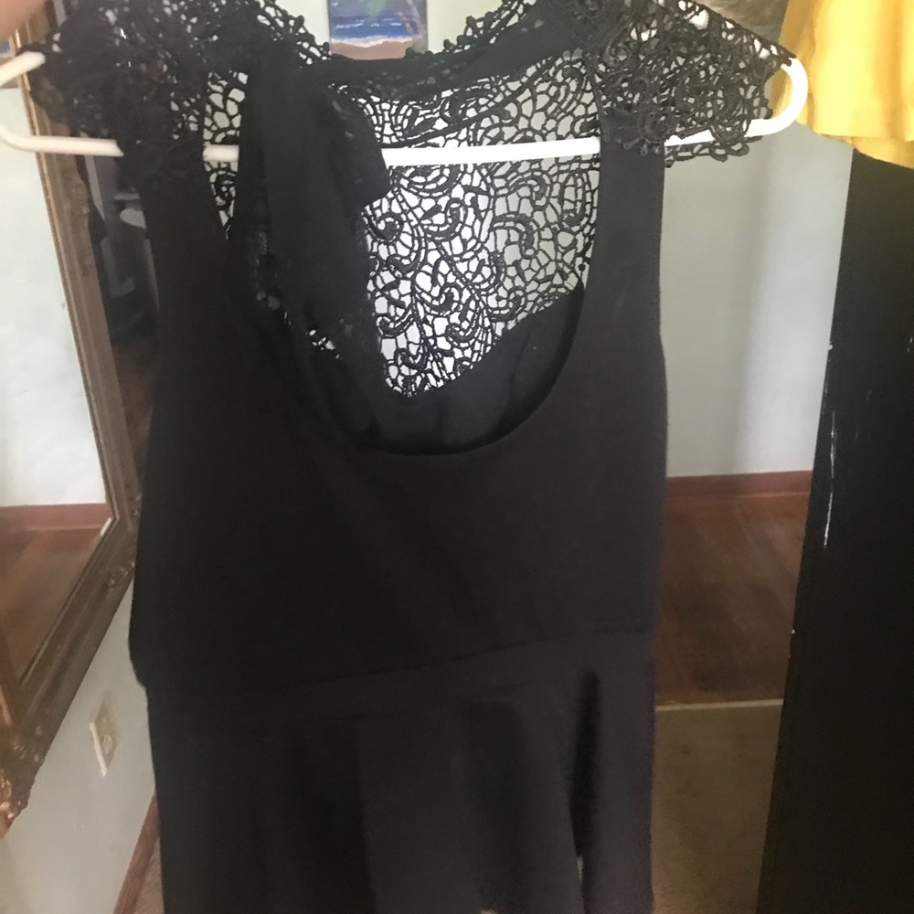 Black shirt, open back