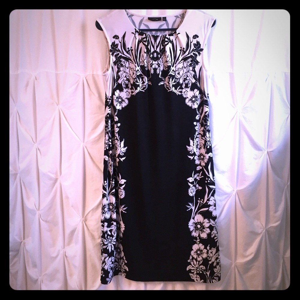 Cream and black dress.