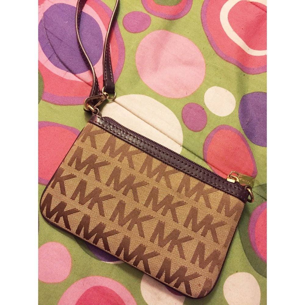 Purple vintage Michael Kors logo wristlet wallet