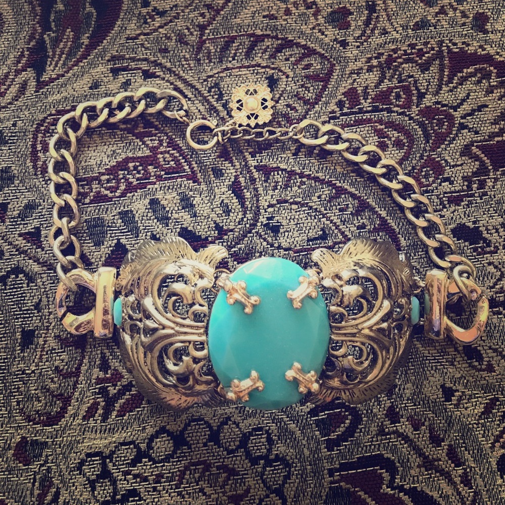 Gold and Turquoise choker style necklace.