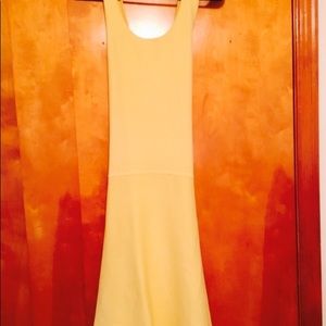 Yellow crisscross above the knee dress