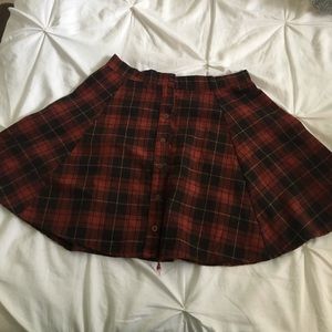Red plaid mini skirt. Brandy Melville.