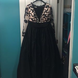 Plus size sheer sleeved evening gown