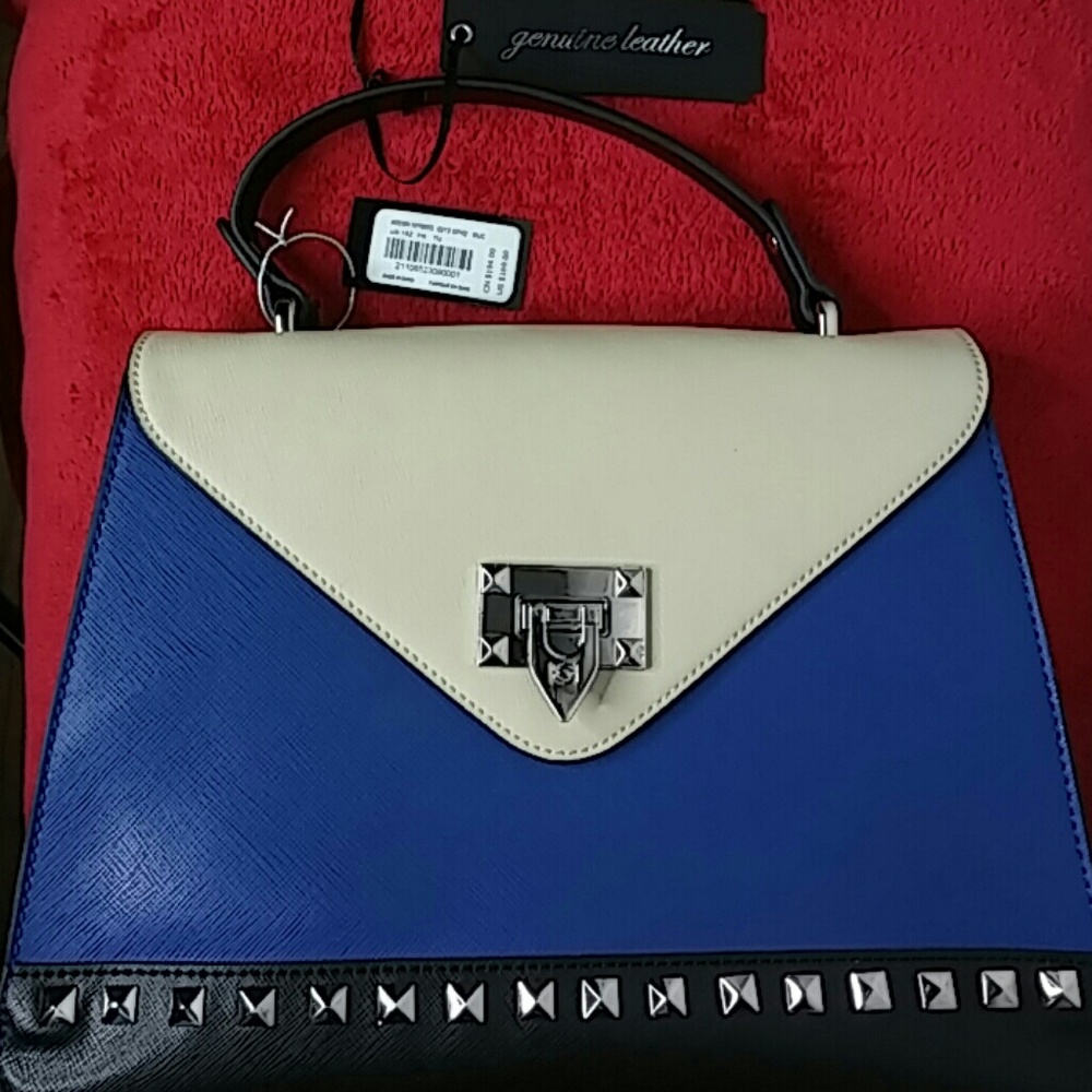 Bebe leather satchel purse.