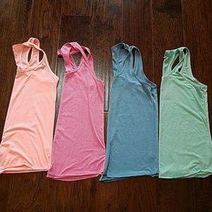 Lot of 4 racerback tanks