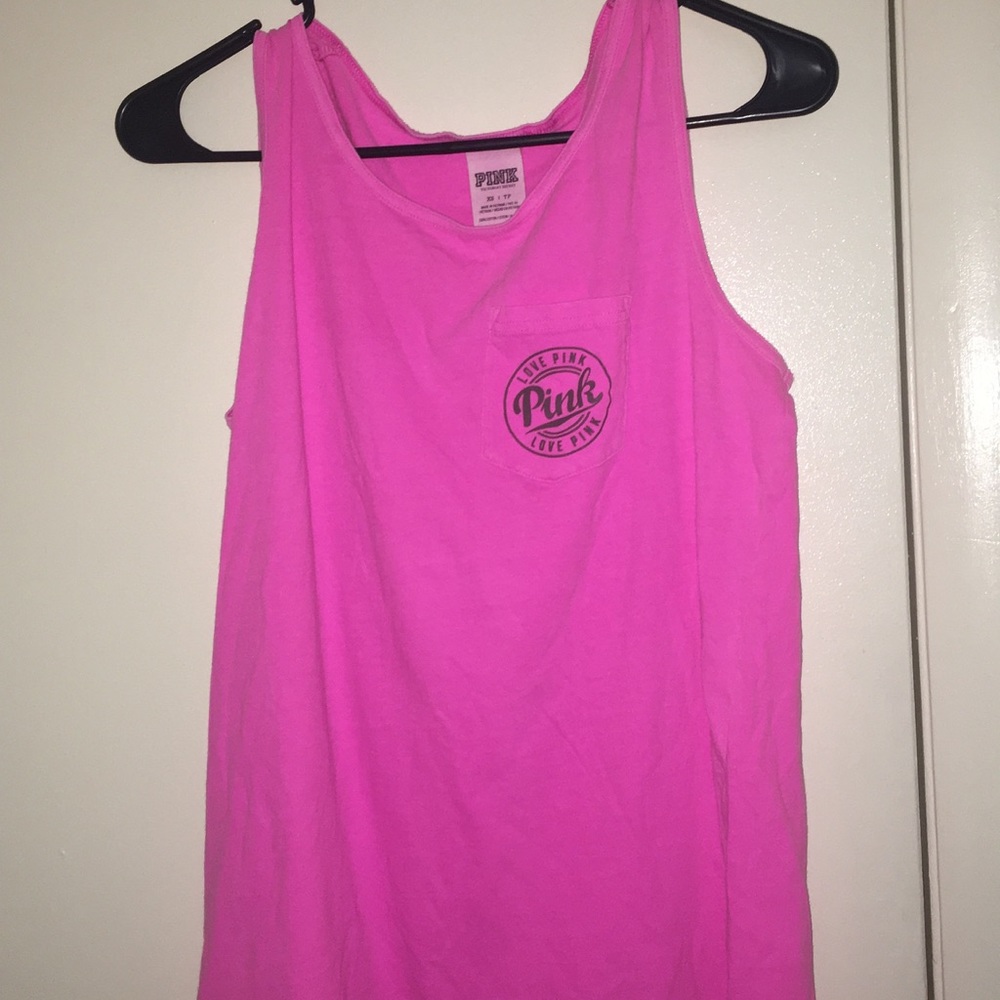 a tank vs pink shirt