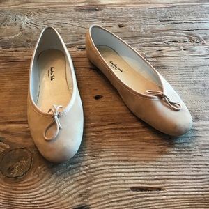 Nude suede flats