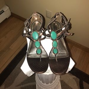 Metallic brown sandals with blue accent