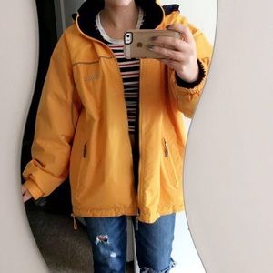 Bright yellow hooded raincoat
