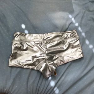 Reversible gold and silver rave shorts