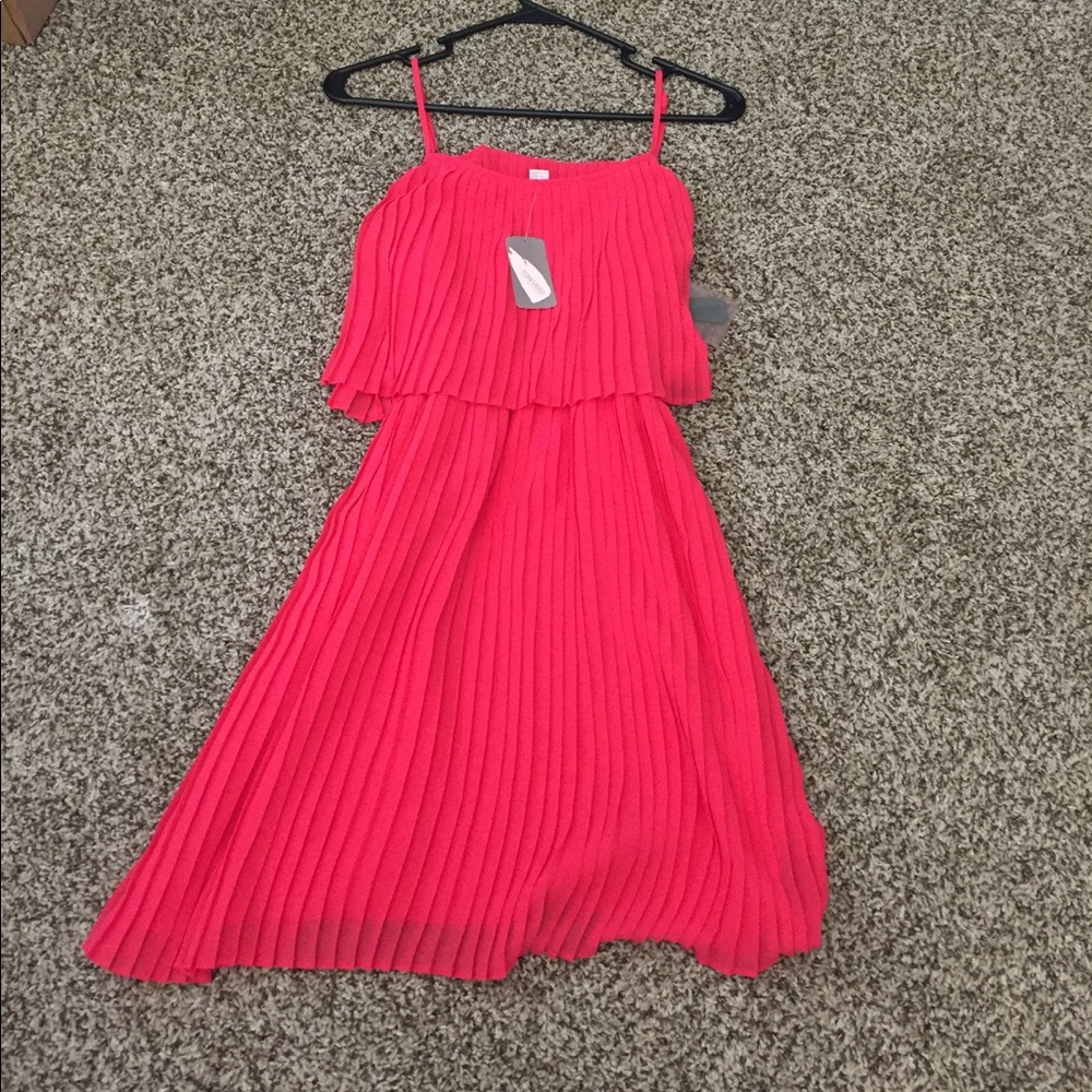 Coral pleated dress