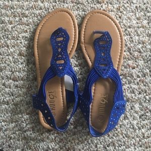 Brand new. Blue sandals.
