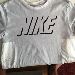 Grey Nike t with side detail. Size M