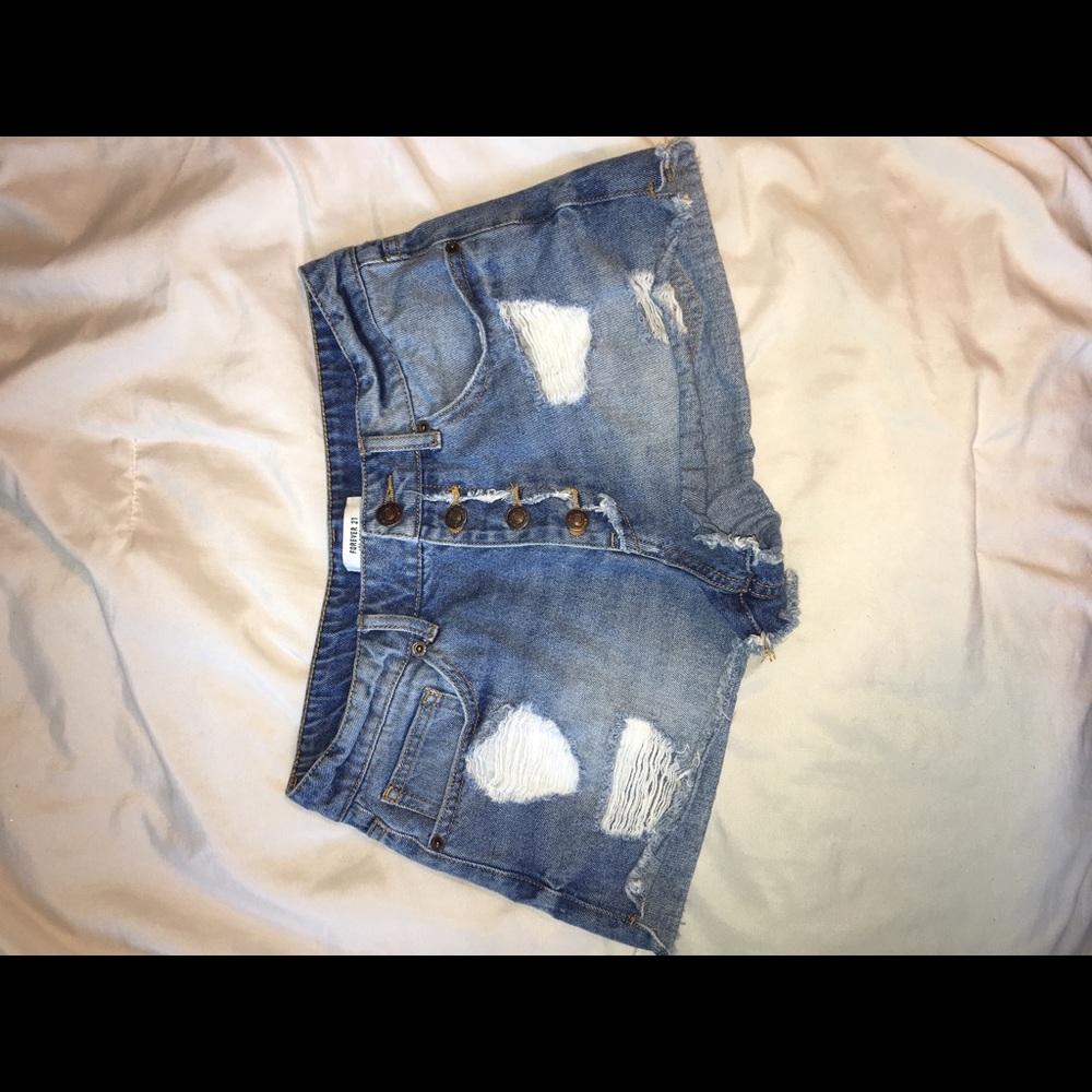 Medium wash, distressed jean shorts - Forever21