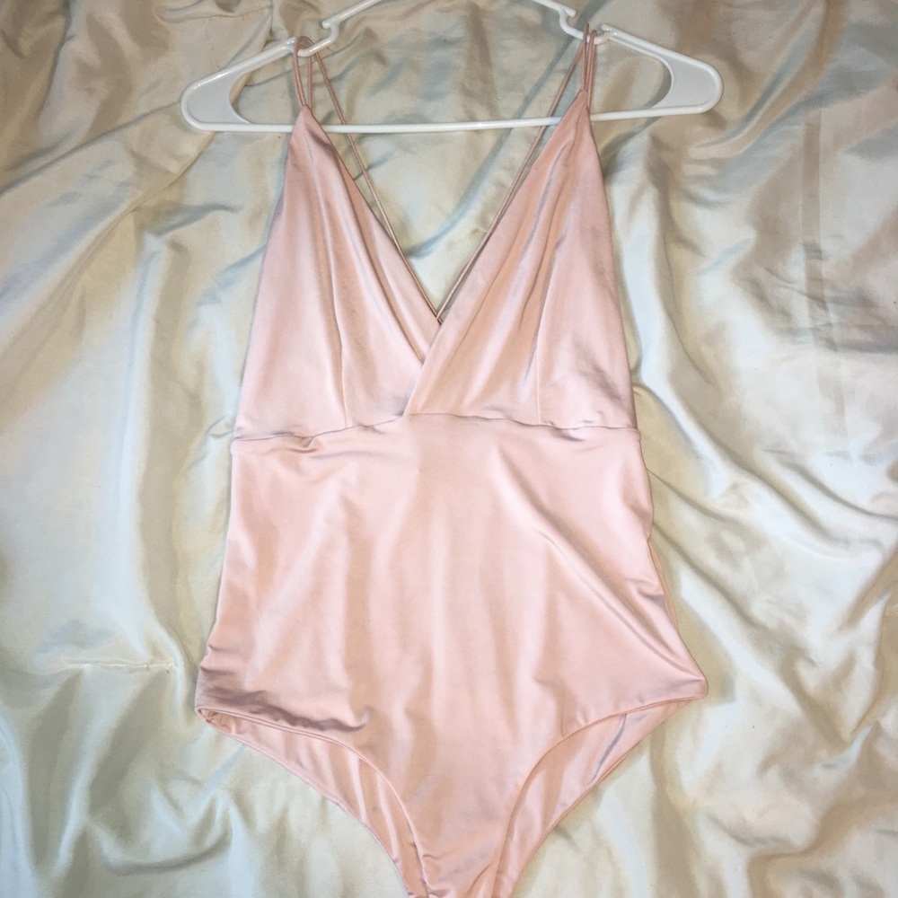 Adorable blush pink bodysuit