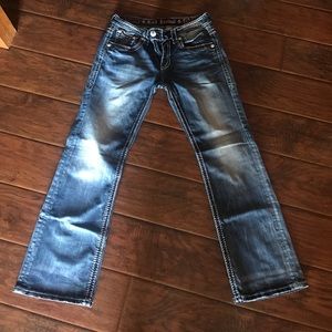 A pair of rock revival or jeans size 31 boot cut !