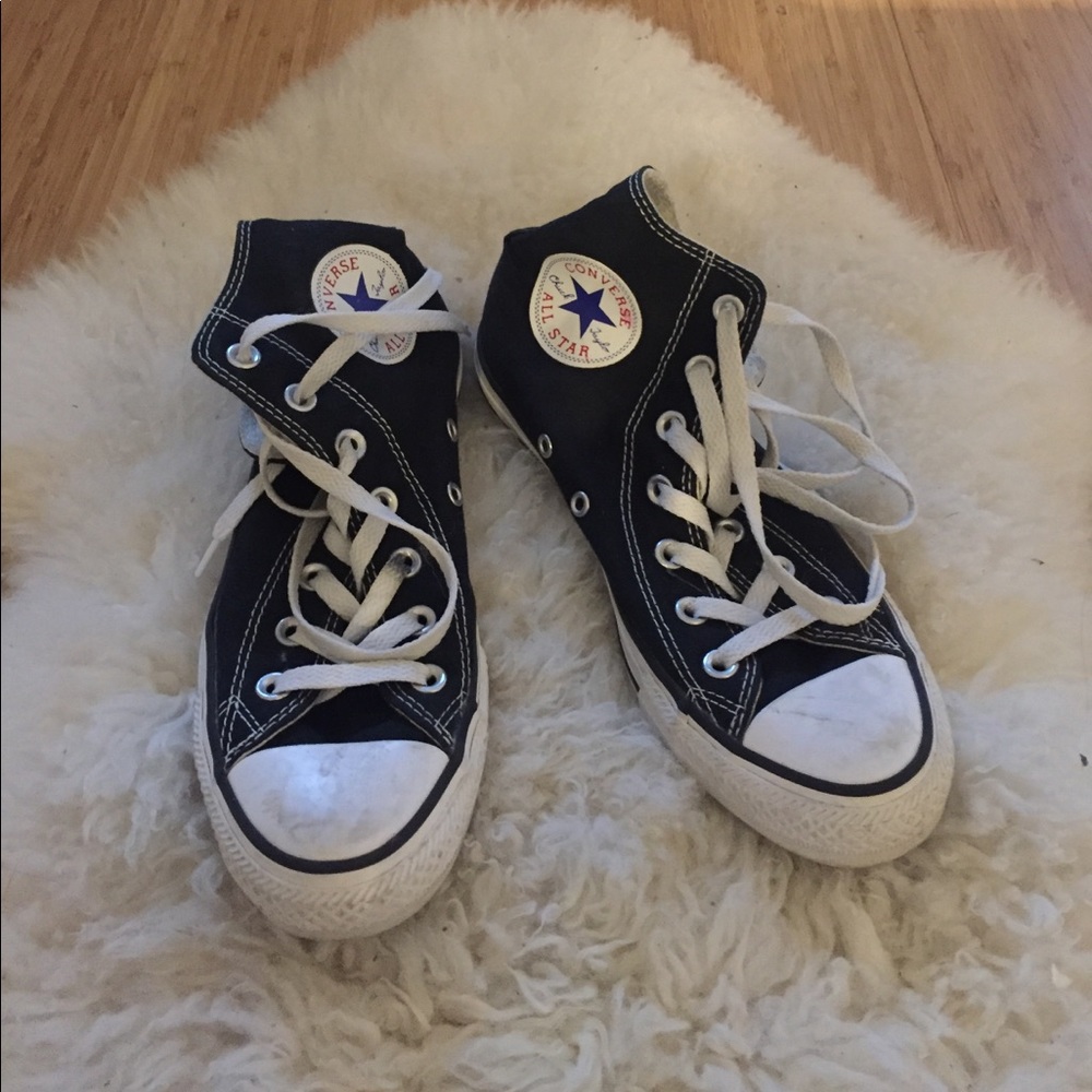 Classic high-top Converse sneakers.
