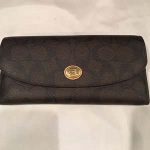 Coach Signature C wallet.