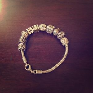 Pandora bracelet with charms (damaged)