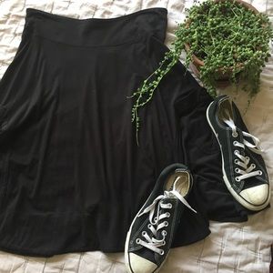 Black knee-length skirt
