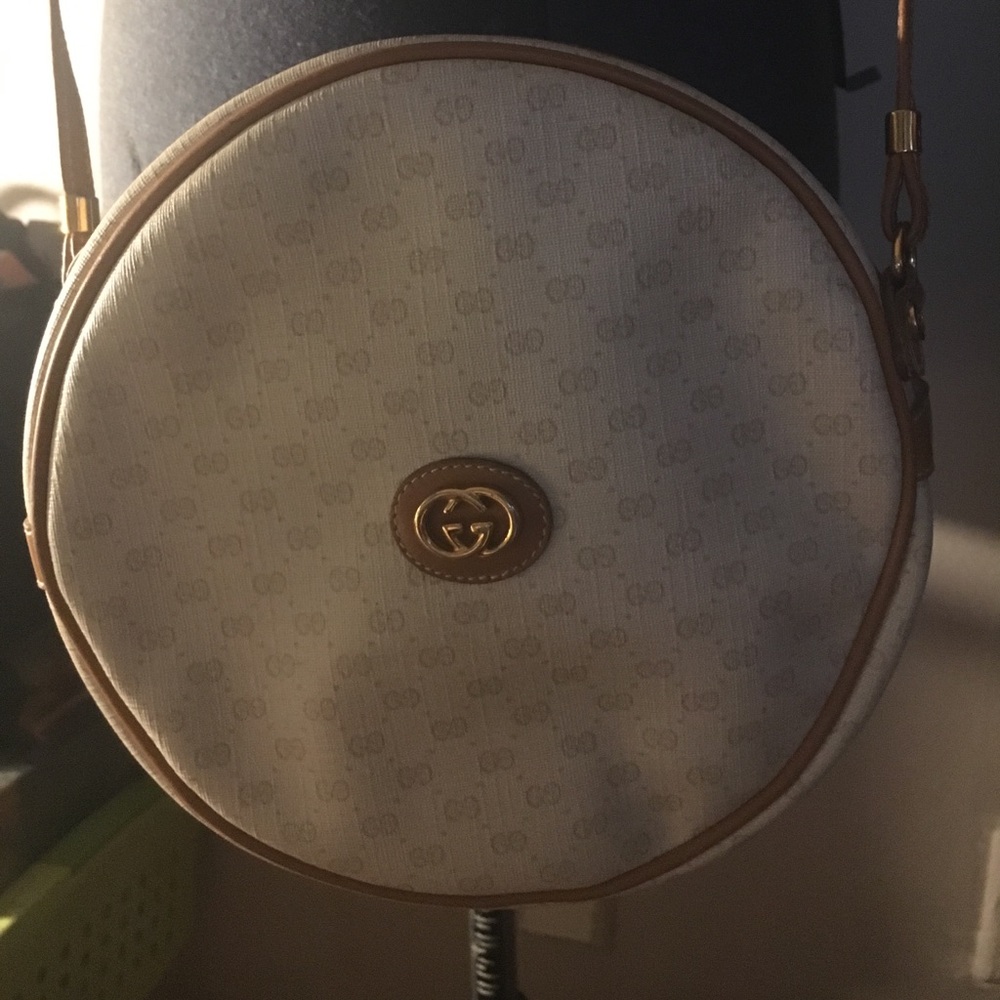 Vintage beige and brown Gucci Round Gucci purse.