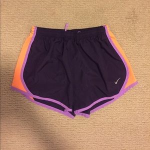 Purple Nike running shorts