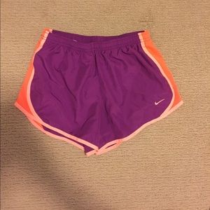 Purple Nike running shorts