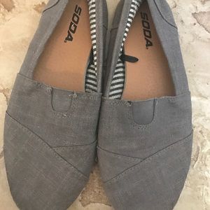 gray soda shoes.