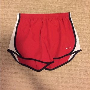 Red Nike running shorts