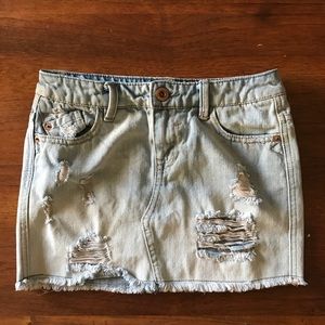 Distressed denim skirt