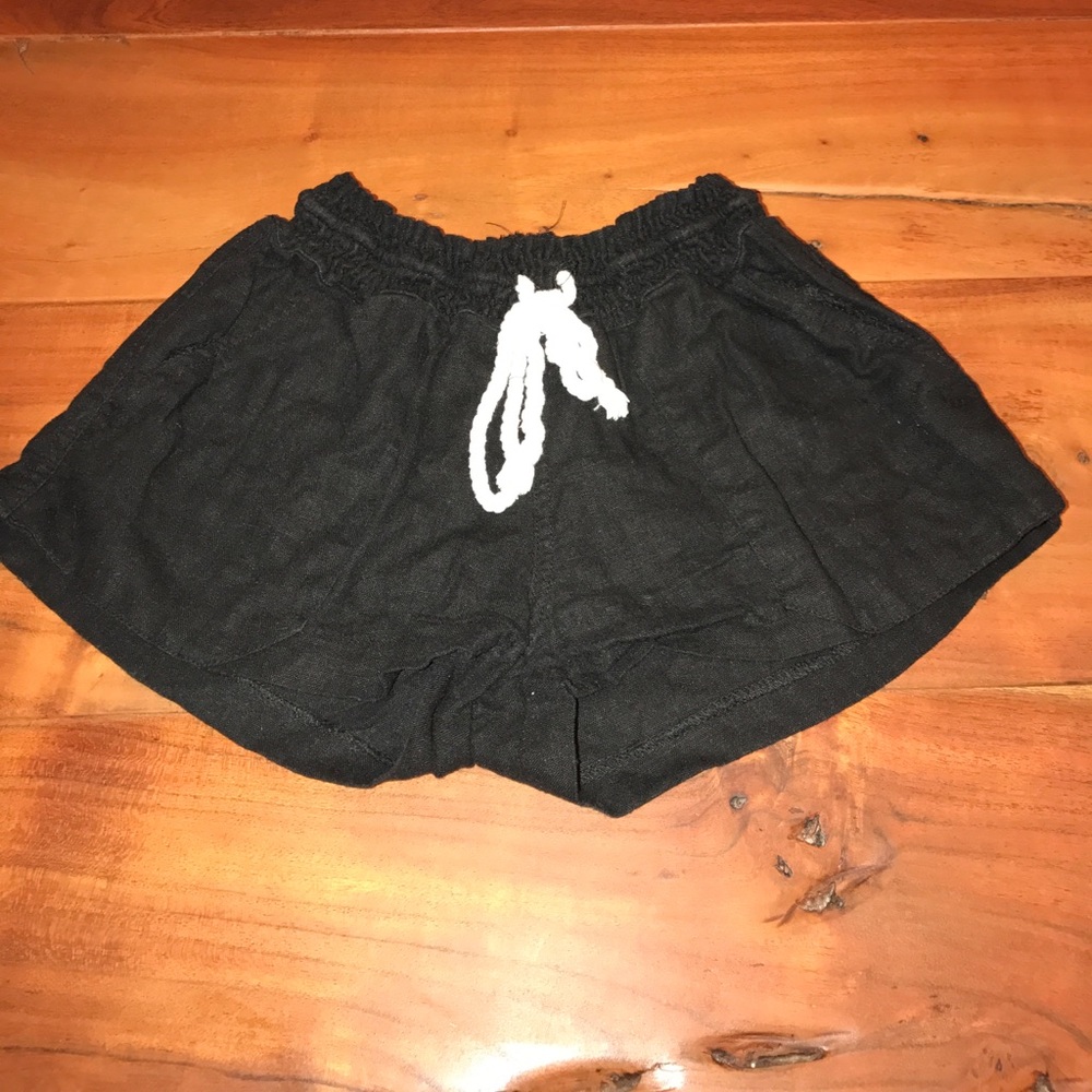 Have Black shorts