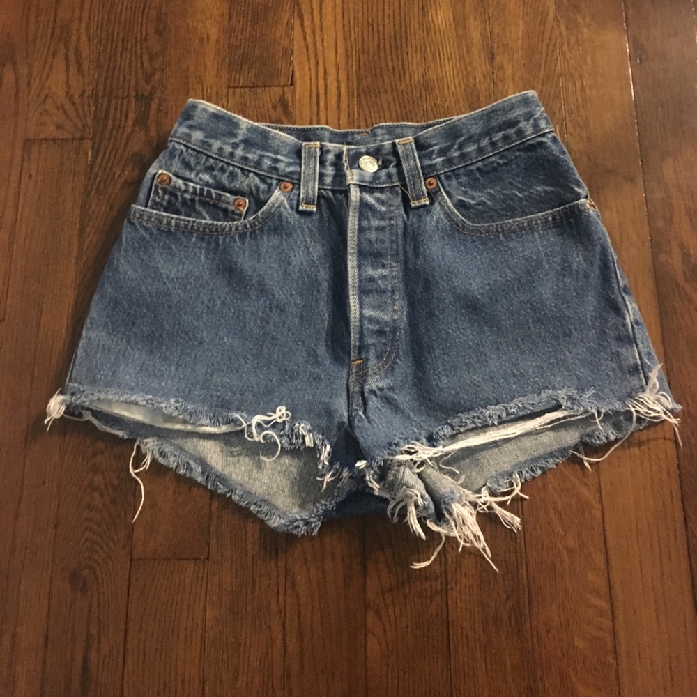 Vintage high waisted Levi cut offs with button fly